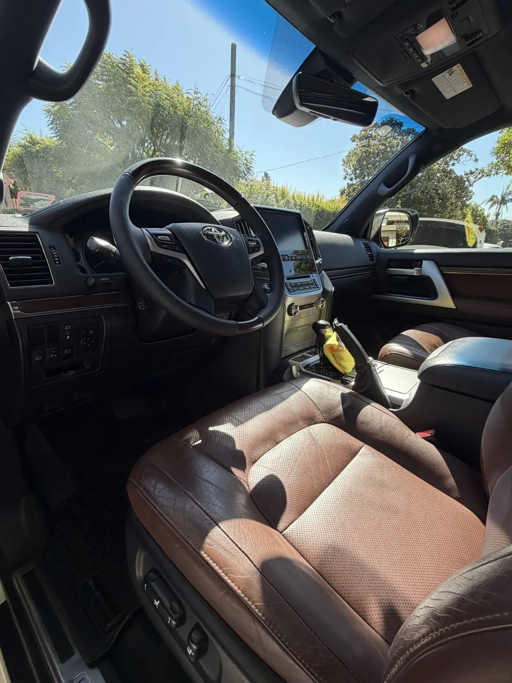 Land Cruiser brown leather cabin after an interior detail