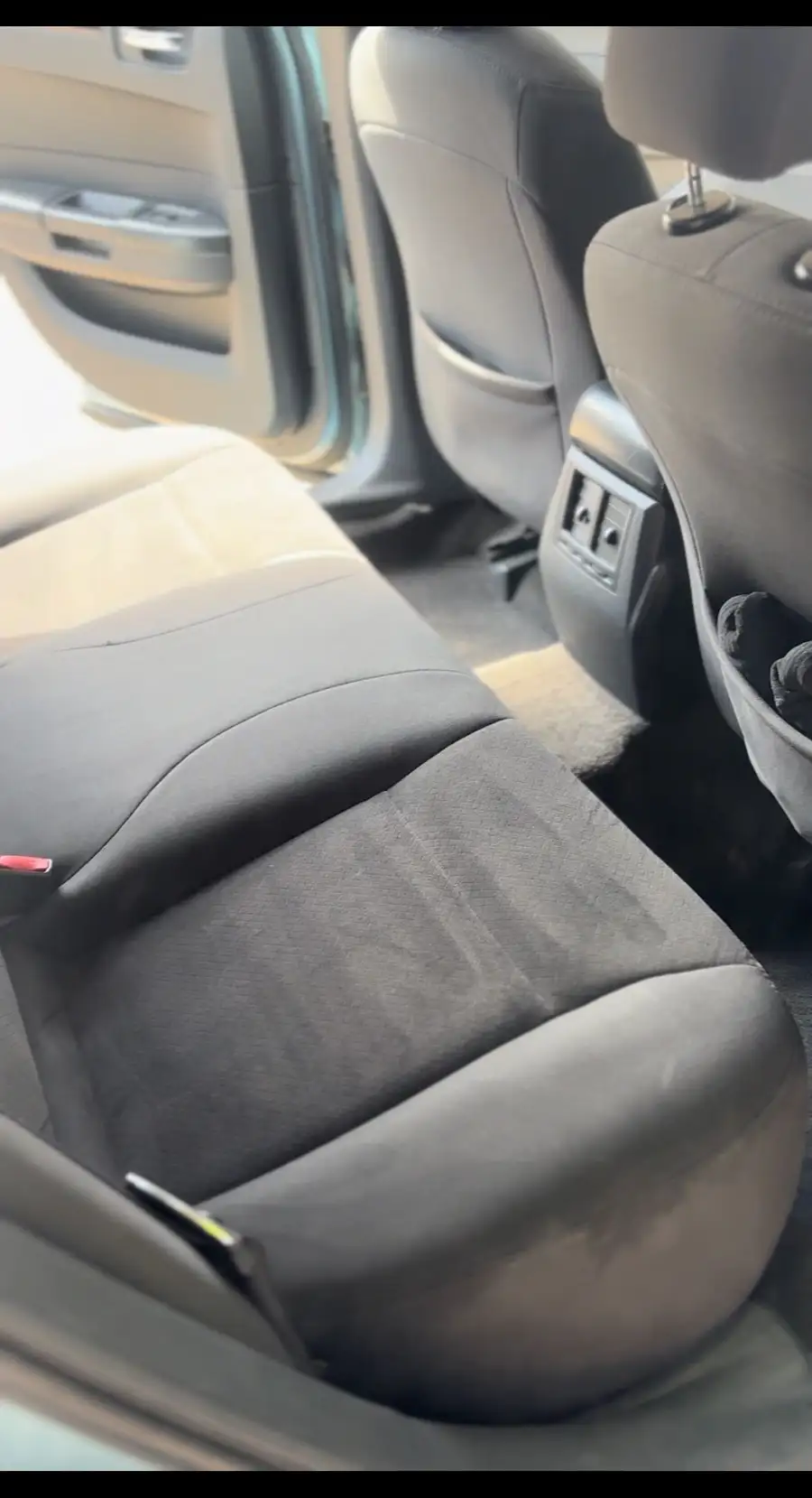 Front cloth seats vacuumed and cleaned